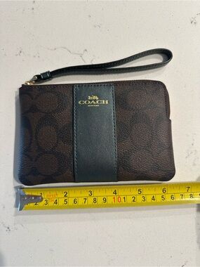 Coach Corner Zip Signature Wristlet with metallic green